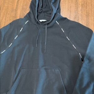 Peloton Black Hoodie with Logo Accents